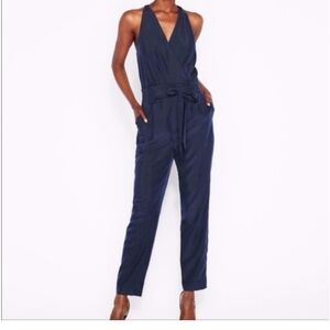 Express Navy Blue Surplice belted jumpsuit w/ pockets Size 2